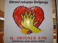 Plakat evropske akcije »Otroci rešujejo življenja«