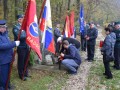 Položitev cvetja in prižiganje sveč