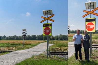 Jurij Borko in Uroš Skuhala pri železniškem prehodu, ki je sedaj opremljen s sistemom COPS@rail