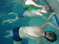 Otroci na plavalnem tečaju