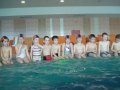 Otroci na plavalnem tečaju