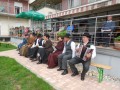 Prvi z desne harmonikar Matej Pušenjak in plesalci